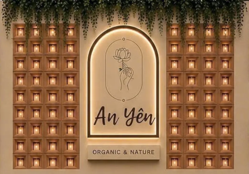 An Yên Holistic Healing Spa · Organic & Nature signage above a warm candle-lit wall
